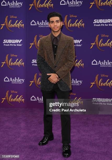 Actor Mena Massoud attends the premiere of Disney's "Aladdin" on May 21, 2019 in Los Angeles, California.