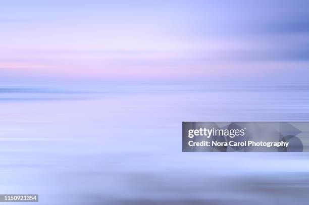 pastel colored sunrise, berawa beach canggu bali - colori manipolati foto e immagini stock