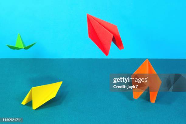 flying planes - jayk7 origami stock pictures, royalty-free photos & images