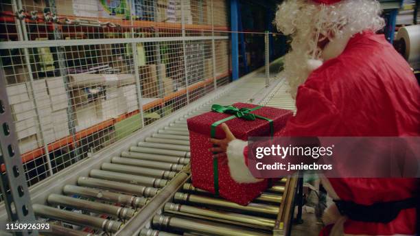 Assembly Line Santa 659 Santa Warehouse Stock Photos, High-Res Pictures, and Images - Getty ...