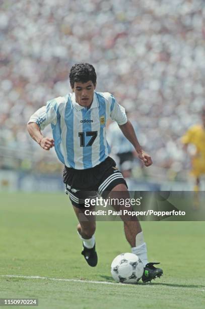 Argentine professional footballer Ariel Ortega, midfielder with River Plate, pictured making a run with the ball during play between Romania and...
