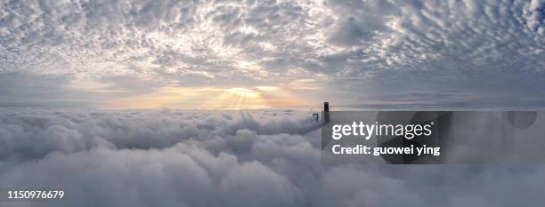 shanghai skyline in heavy fog - aircraft point of view stock pictures, royalty-free photos & images