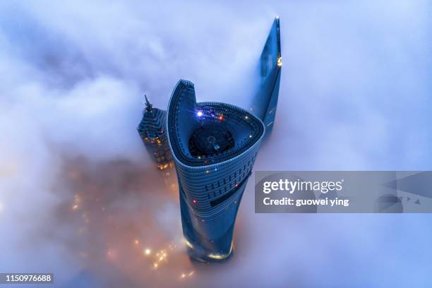 shanghai skyline in heavy fog - jin mao tower bildbanksfoton och bilder