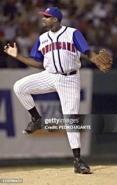 Domincan Republic pitcher, Antonio Alfonseca celebrates after the last out against Venezuela in the ninth inning 06 February, 2000 in Santo Domingo....