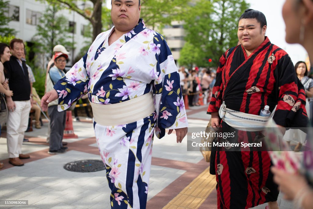 Sumo wrestlers are seen wearing colorful traditional yukata kimono ...