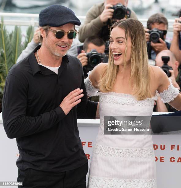 Margot Robbie and Brad Pitt attend the photocall for "Once Upon A Time In Hollywood" during the 72nd annual Cannes Film Festival on May 22, 2019 in...
