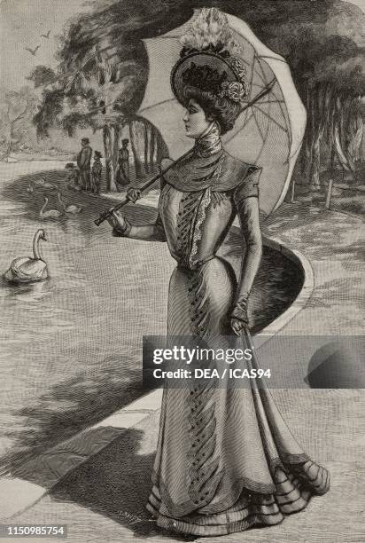 Young woman in a spring dress with umbrella, engraving by Baude from Giornali di Moda by Treves Publishers, from Illustrazione Popolare, Giornale per...