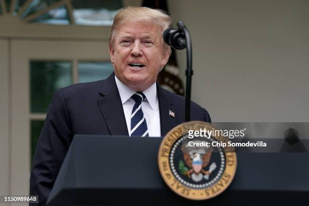 President Donald Trump speaks about Robert Mueller's investigation into Russian interference in the 2016 presidential election in the Rose Garden at...