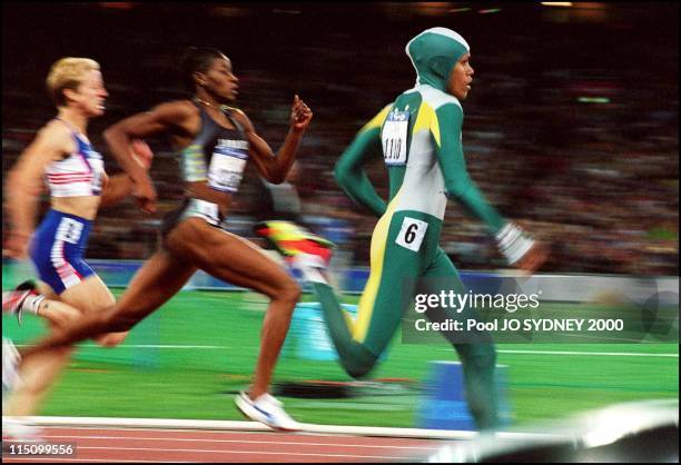 Sydney Olympics: Athletics: Cathy Freeman wins women's 400 meters final in Sydney, Australia on September 25, 2000.