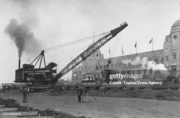 Construction of the Australian pavilion for the British Empire Exhibition, showing Sir Robert McAlpine's Giant Excavator, May 1923.