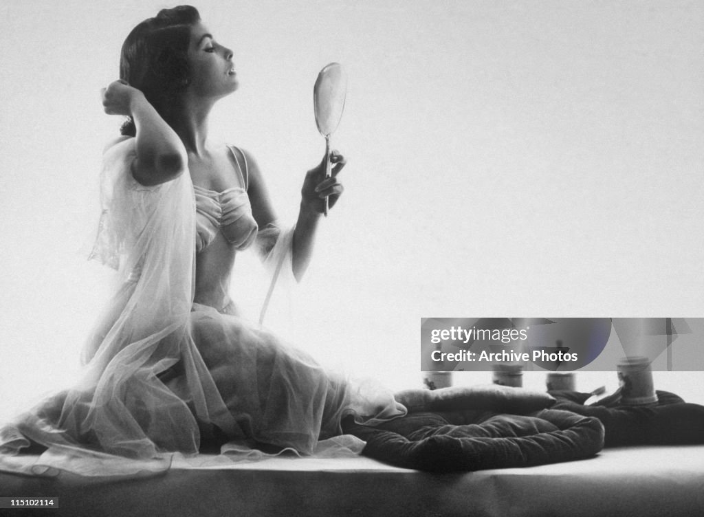 Checking Her Make Up