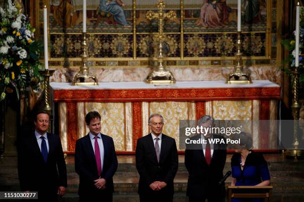 Britain's Prime Minister Theresa May speaks next to Tony Blair, David Cameron, Gordon Brown and Nick Clegg during a service of thanksgiving for Lord...