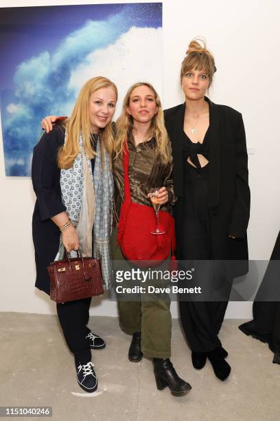 Guest, Ayesha Shand and Charlotte Colbert at the Animal Ball Art Show Private Viewing, presented by Elephant Family on May 22, 2019 in London,...