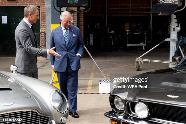 Britain's Prince Charles , Prince of Wales meets British actor Daniel Craig as he tours the set of the 25th James Bond Film at Pinewood Studios on...