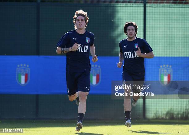 Nicolo Zaniolo and Sandro Tonali of Italy in action during a training session at Casteldebole Training Center on June 20, 2019 in Bologna, Italy.