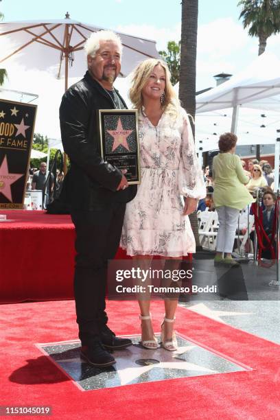 Guy Fieri and Lori Fieri attend a ceremony honoring Guy Fieri with a star on the Hollywood Walk of Fame on May 22, 2019 in Hollywood, California.