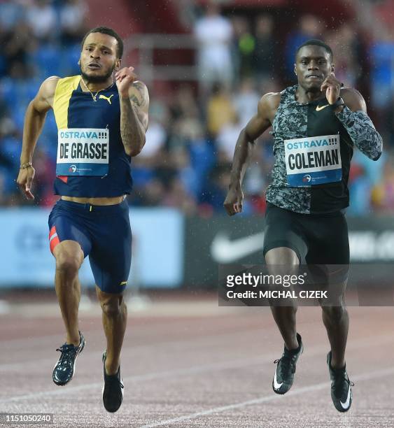 Winner Andre De Grasse of Canada finishes ahead of Christian Coleman of the USA during the 200m Men sprint of IAAF Golden Spike 2019 Athletics...