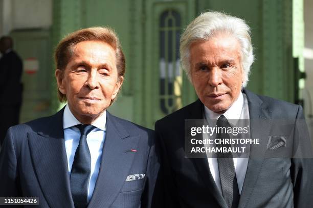 Italian fashion designer Valentino Garavani and Italian business man Giancarlo Giammetti arrive for the "Karl For Ever" event to honour late German...