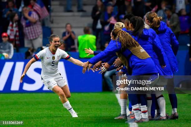 United States' defender Kelley O'Hara celebrates after her team's second goal during the France 2019 Women's World Cup Group F football match between...