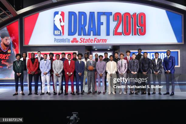 Commissioner Adam Silver poses with Sekou Doumbouya, Keldon Johnson, Nickeil Alexander-Walker, Jarrett Culver, Coby White, Ja Morant, Darius Garland,...