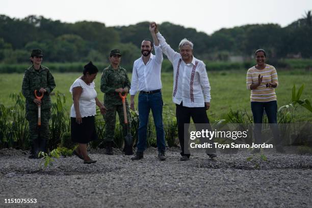 Mexico President Manuel Lopez Obrador and El Salvador President Nayib Bukele wave during a joint press conference launching the Planting Life...