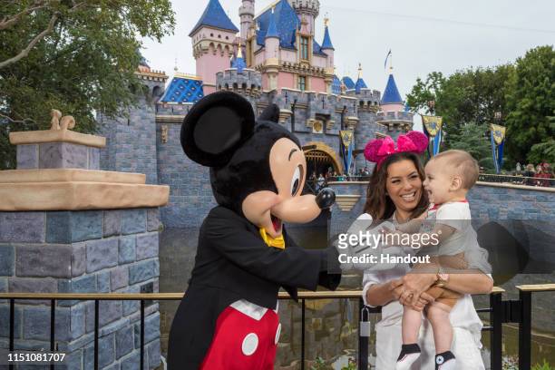 In this handout photo provided by Disneyland Resort, Eva Longoria and her son Santiago Enrique Bastón celebrate his first birthday and first...