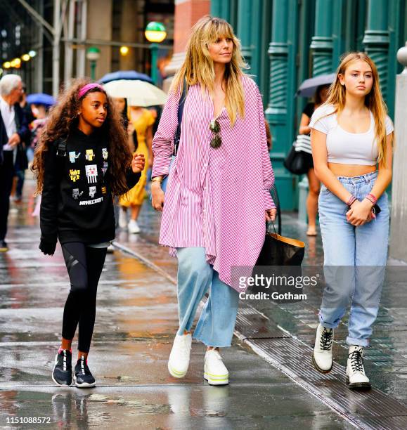 Heidi Klum goes shopping in Soho with her kids Lou Samuel and Helene Samuel on June 20, 2019 in New York City.
