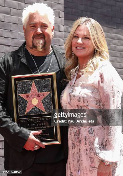 Chef / TV Personality Guy Fieri and his Wife Lori Fieri attend the ceremony to honor Guy Fieri with a Star on the Hollywood Walk of Fame on May 22,...