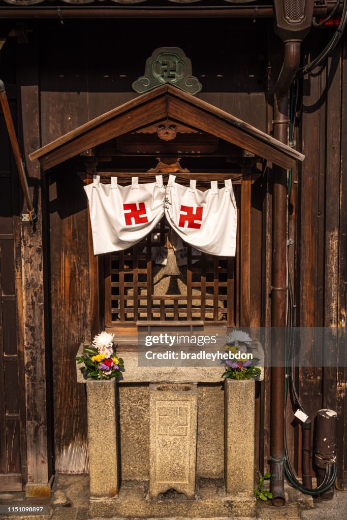 Tiny roadside shrine in Kyoto, Japan
