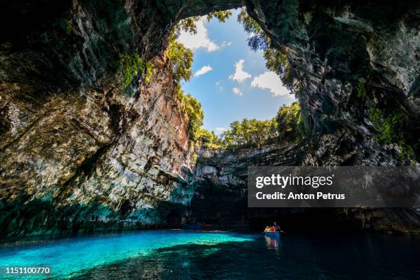 famous melissani lake on kefalonia island, greece - kefalonia fotografías e imágenes de stock