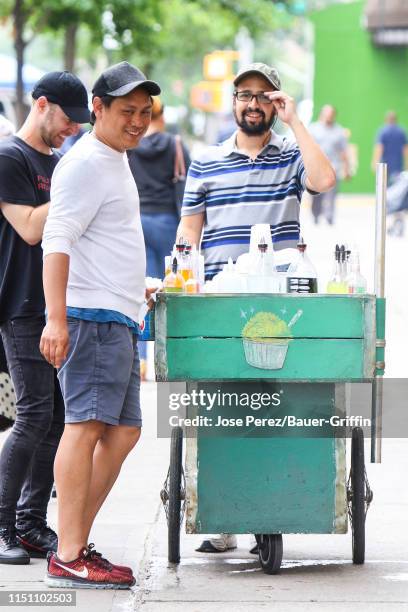 Jon M. Chu and Lin-Manuel Miranda are seen on the film set of 'In the Heights' on June 20, 2019 in New York City.