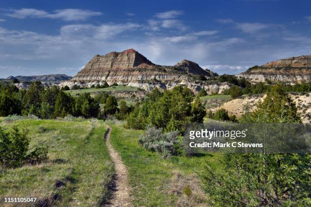 there are mountains and valleys to explore - north dakota stock pictures, royalty-free photos & images