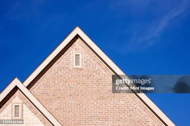 fascia and ridge of gable roof - rooftop hvac stock pictures, royalty-free photos & images