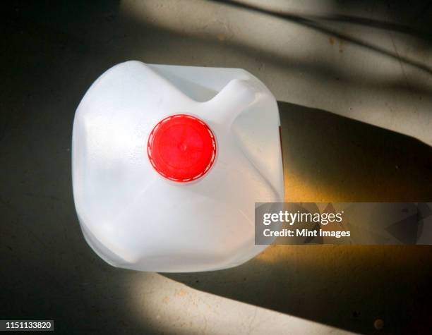 overhead of plastic gallon water jug - gallon stock pictures, royalty-free photos & images