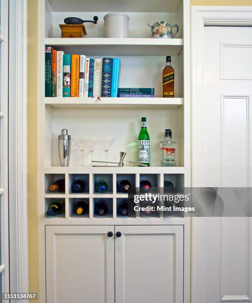 built in shelving and wine rack - wine rack stock pictures, royalty-free photos & images