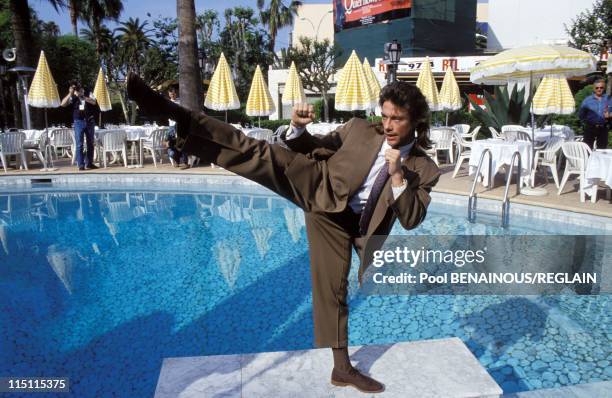 Cannes: Jean Claude Van Damme before the pool of Majestic in Cannes, France on May 13, 1993 - At Hotel Majestic.