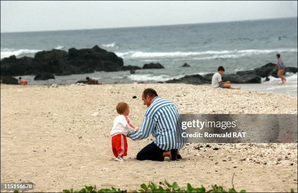 Jacques Chirac on the beach with his daughter Claude and his grandson Martin in France on August 03, 1997.