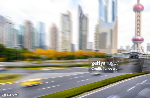 shanghai urban road - speed motion lines to the middle stock-fotos und bilder