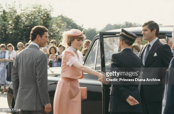 Prince Charles and Diana, Princess of Wales arrive at Romsey Station in England at the end of their wedding day, 29th July 1981. She is wearing an...