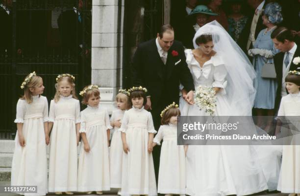 Nicholas Soames and Catherine Weatherall pose with their bridesmaids during their wedding at St Margaret's Church in London, 4th June 1981.