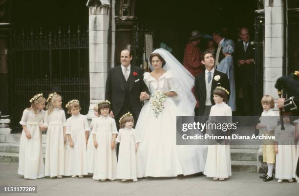 Nicholas Soames and Catherine Weatherall pose with their bridesmaids and Prince Charles, the best man, during their wedding at St Margaret's Church...