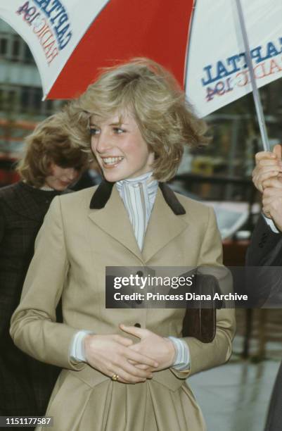 Diana, Princess of Wales wears a Catherine Walker suit during a visit to Capital Radio in London, November 1982.