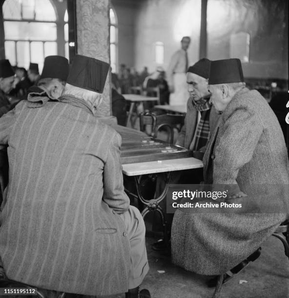Men playing backgammon in a cafe in Beirut, Lebanon, 1951.