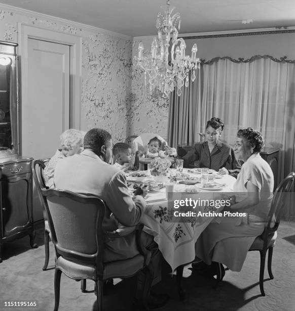 American baseball player Jackie Robinson with his wife Rachel and their children Jackie Jr and Sharon, circa 1950.