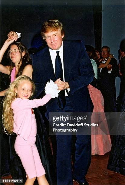 American real estate developer Donald Trump dances with his daughter, Tiffany Trump, at the Mar-a-Lago estate, Palm Beach, Florida, 1990s.