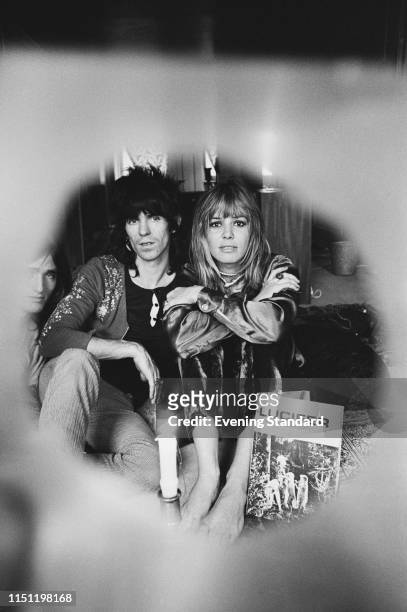 English musician, singer, and songwriter Keith Richards of the Rolling Stones with his wife German-Italian actress, artist, and model Anita...