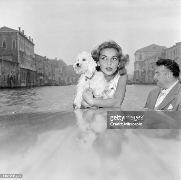 Venice Film Festival, Italy, Monday 3rd September 1956; pictured is Abbe Lane, American singer and actress, enjoys a motorboat ride along the Grand...