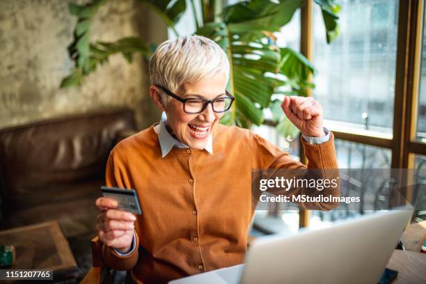 Woman Celebrate Computer Photos and Premium High Res Pictures - Getty ...