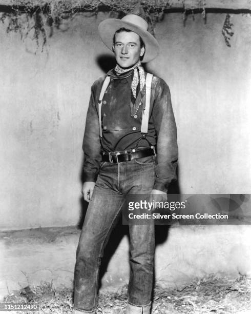 American actor John Wayne as the Ringo Kid in a publicity still for the Western film 'Stagecoach', 1939.