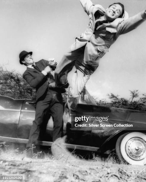 Scottish actor Sean Connery as James Bond in a fight scene from the film 'Dr No', 1962.